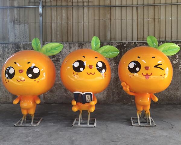 濃紅色的玻璃鋼紅蜜桔雕塑