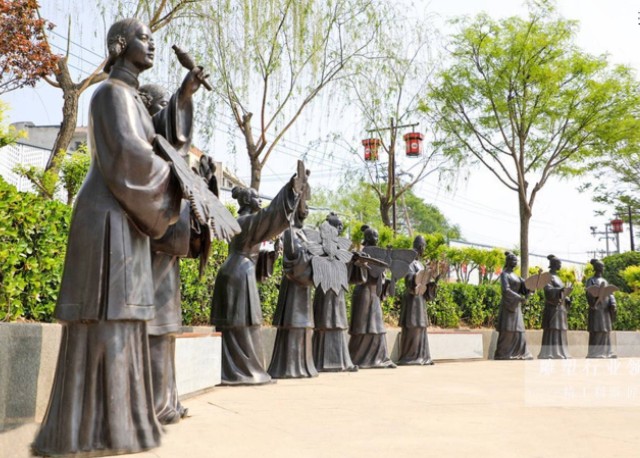 復古仿銅玻璃鋼放風箏人物雕塑